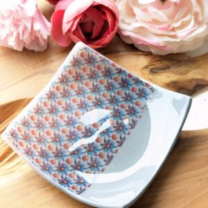 Floral Dish - Translucent and grey clay half and half dish with floral pattern on two thirds of the dish giving it an asymmetrical patterned design. High gloss coating