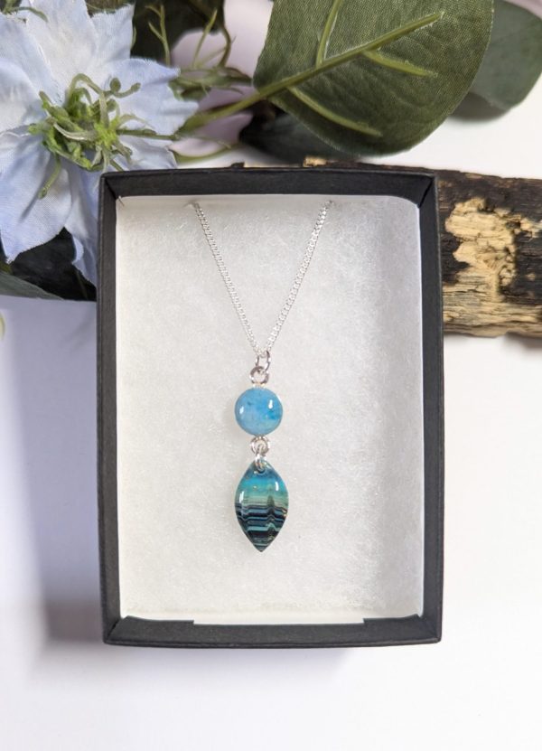 Ocean Waves Necklace - blue, green and black wavy patter leaf shape pendant and tropical ocean blue connector pendant on a sterling silver chain